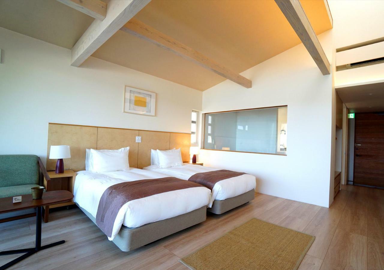 Miru Amami Hotel Tatsugo Buitenkant foto