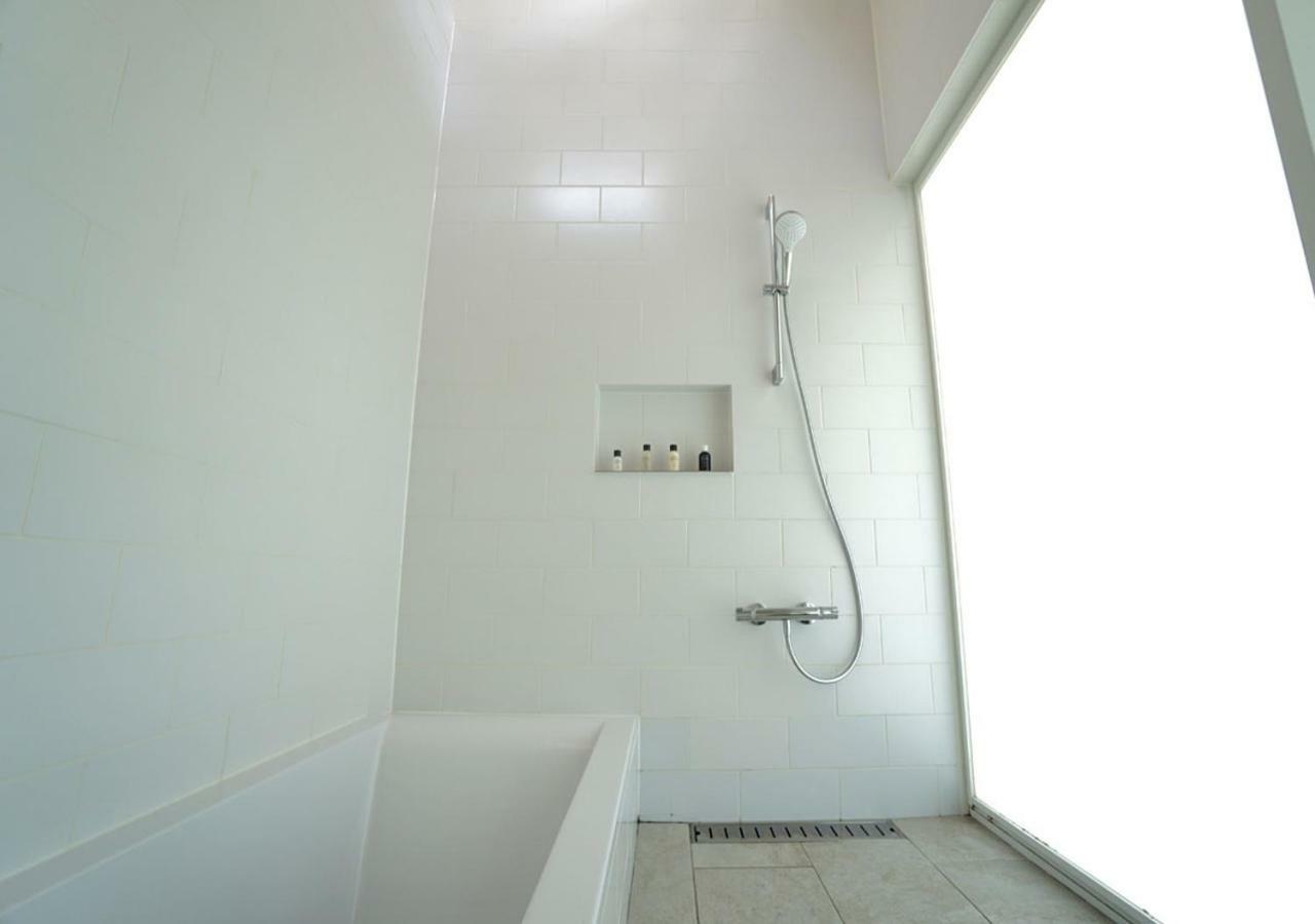 Miru Amami Hotel Tatsugo Buitenkant foto