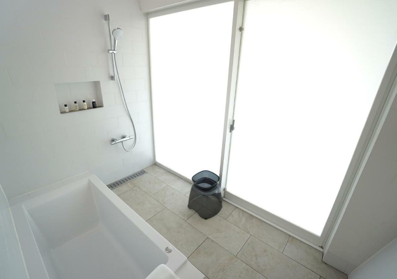 Miru Amami Hotel Tatsugo Buitenkant foto